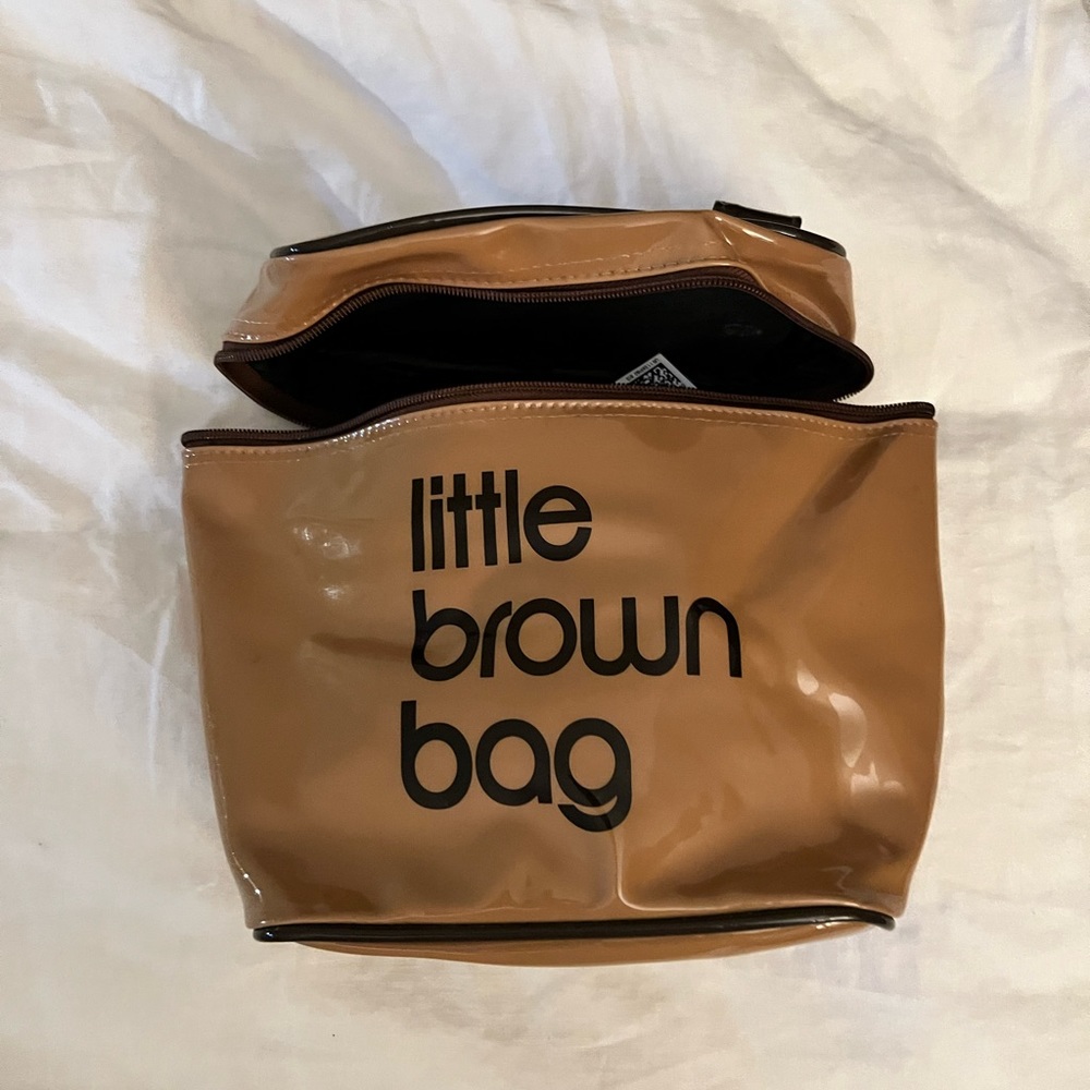 Bloomingdale’s “little brown bag” toiletry bag.